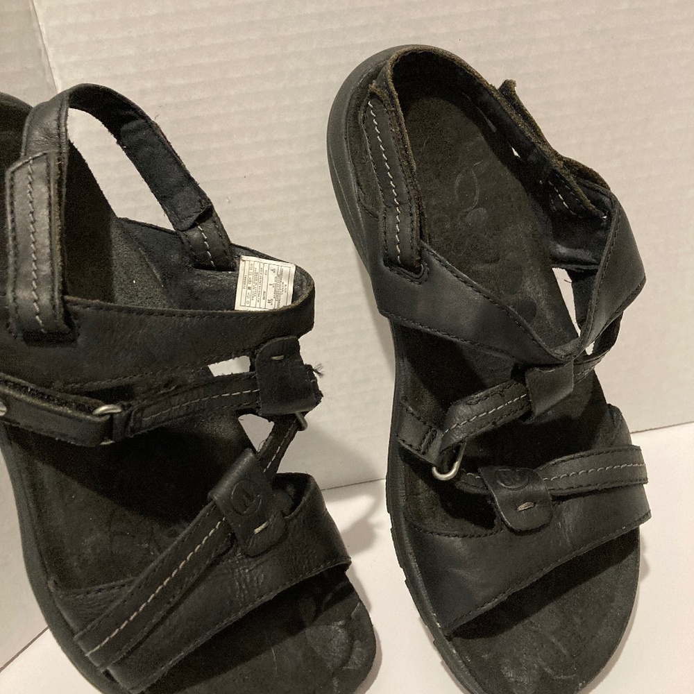 Merrill, sandals, leather uppers all straps are adjustable Black in colors.